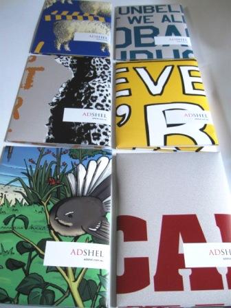 Recycled A4 folders made from various Adshel poster campaigns by recycled.co.nz
